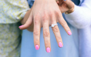 File:A woman displays her engagement ring.jpg