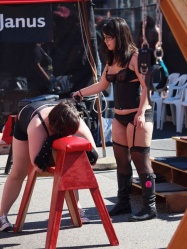 F/F spanking at Folsom Street Fair, 2010.