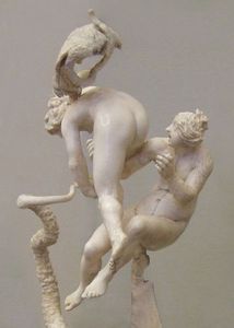An interesting sculpture - could be interpreted as spanking but this is probably wishful thinking. ;)
