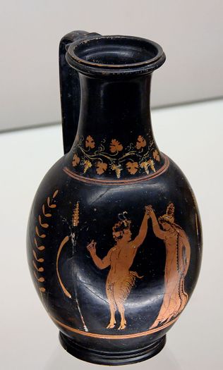 God Pan (mythology) and a Maenad dancing. Ancient Greek red-figured wine (olpe) from Apulia, ca. 320–310 BCE. Pan's right hand fingers are in a snapping position.