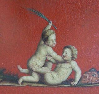 Two putti fighting, one with a rod