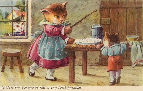 An anthropomorphic cat mother threatens her kitten, who's interested in the pie or cake on the table, with a stick. Vintage French postcard.