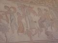 Aphrodite spanking Eros, mosaic in Hippolytus Hall, Madaba, Jordan.