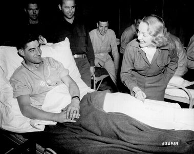 Marlene Dietrich and U.S. Army Technician Fourth Grade Earl E. McFarland in Belgium (24 November 1944)