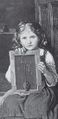 A schoolgirl in primary school age.