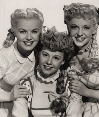 Left to right: June Haver, Vera-Ellen, and Vivian Blaine in Three Little Girls in Blue (1946)
